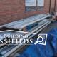 Cold Formed Steel Building Parts Under Blue Tarp