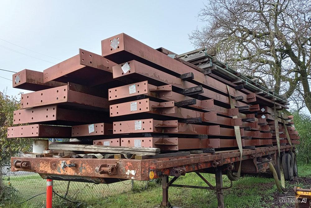 CA1821 Red Iron Building Material Loaded on a Trailer